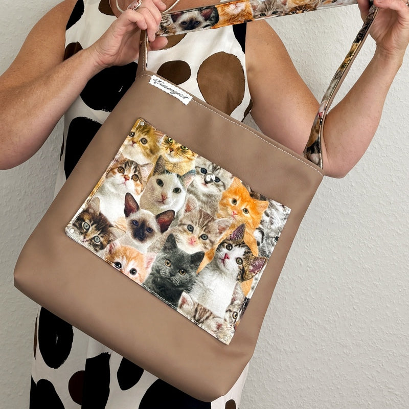 Einkaufsshopper mit einem breiten Schulterträger