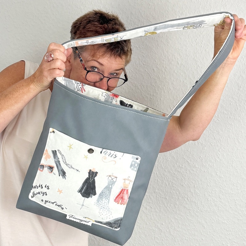 Einkaufsshopper mit einem breiten Schulterträger
