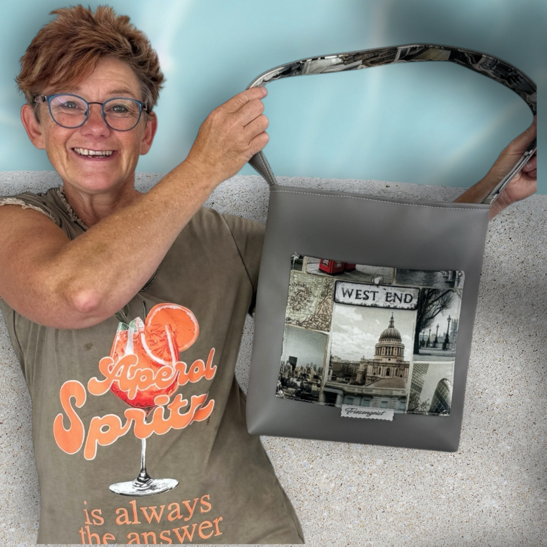 Einkaufsshopper mit einem breiten Schulterträger