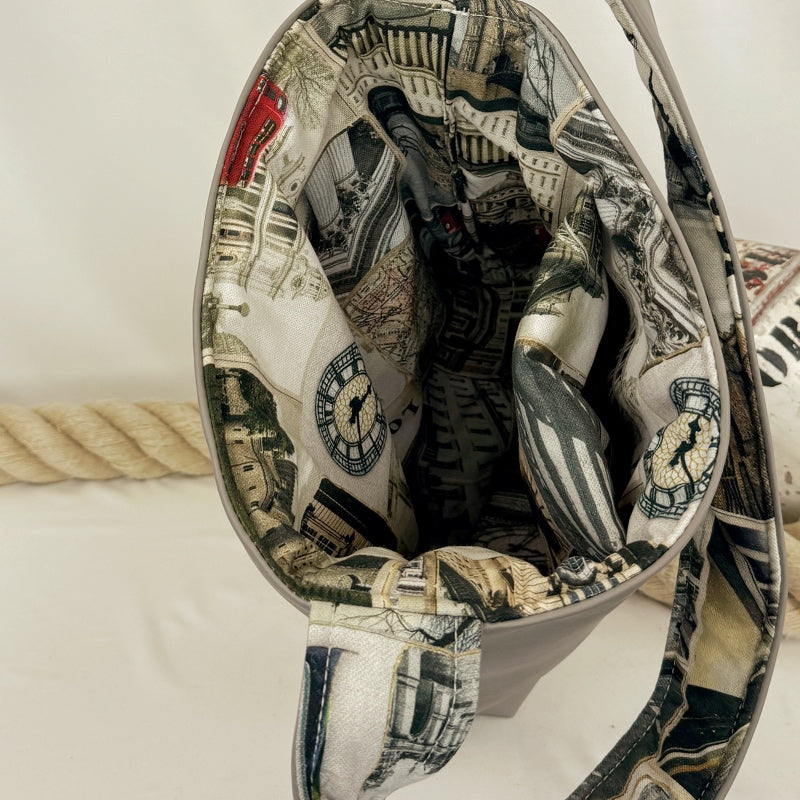 Einkaufsshopper mit einem breiten Schulterträger