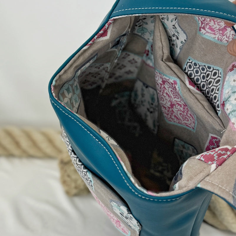 Einkaufsshopper mit einem breiten Schulterträger