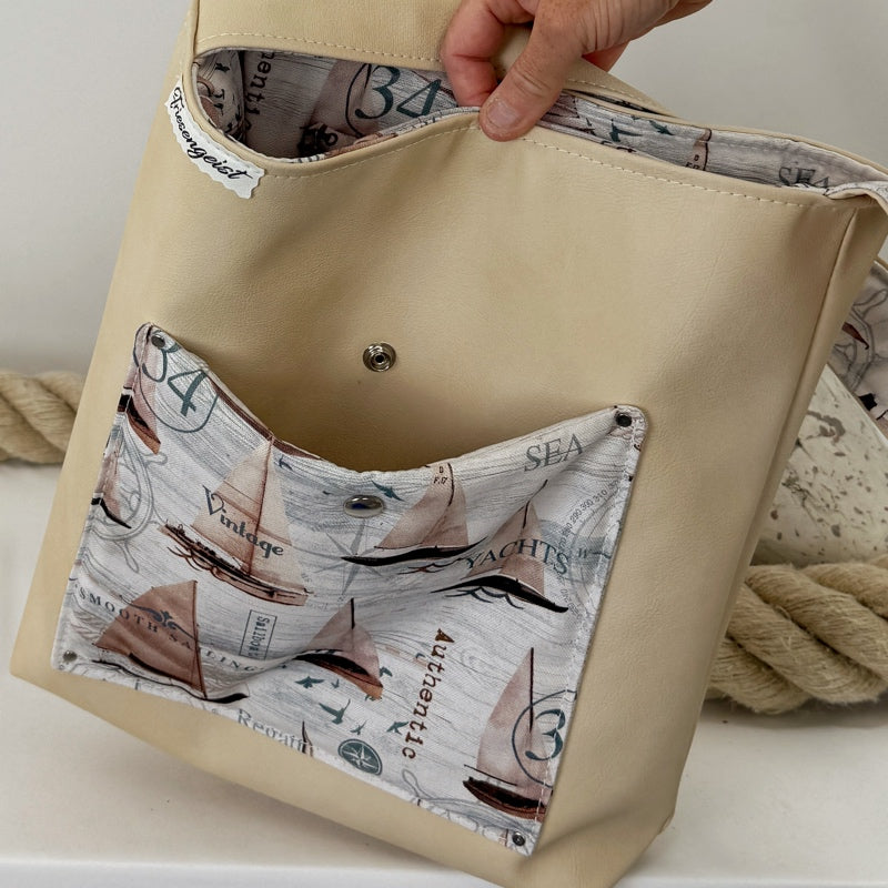 Einkaufsshopper mit einem breiten Schulterträger