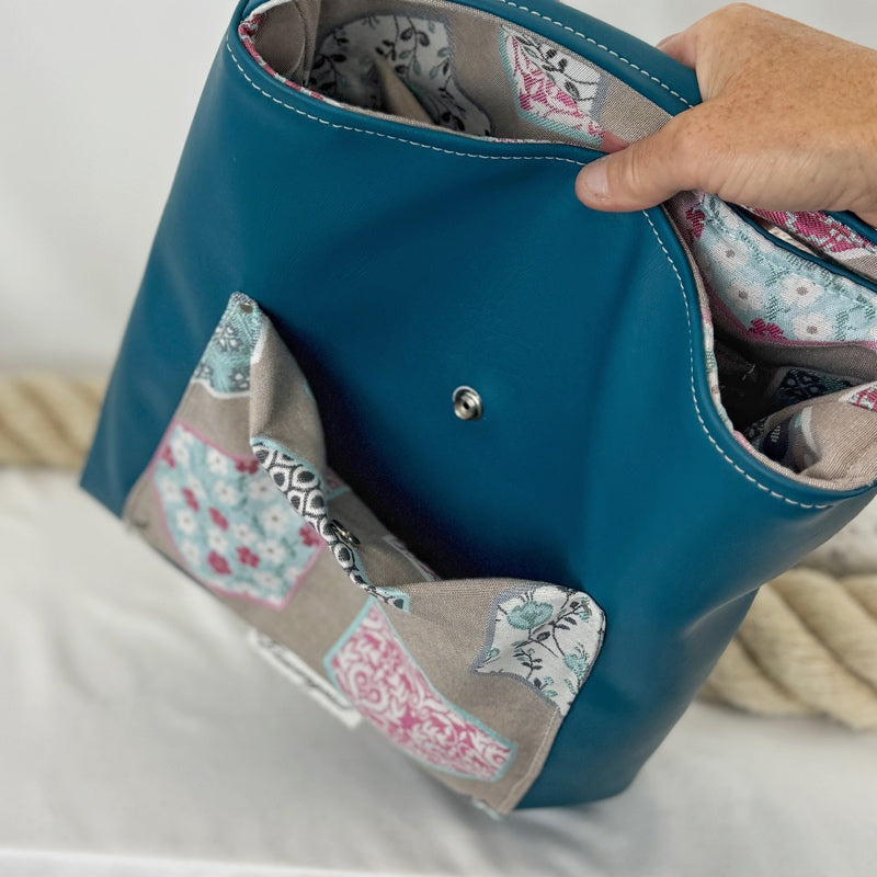 Einkaufsshopper mit einem breiten Schulterträger