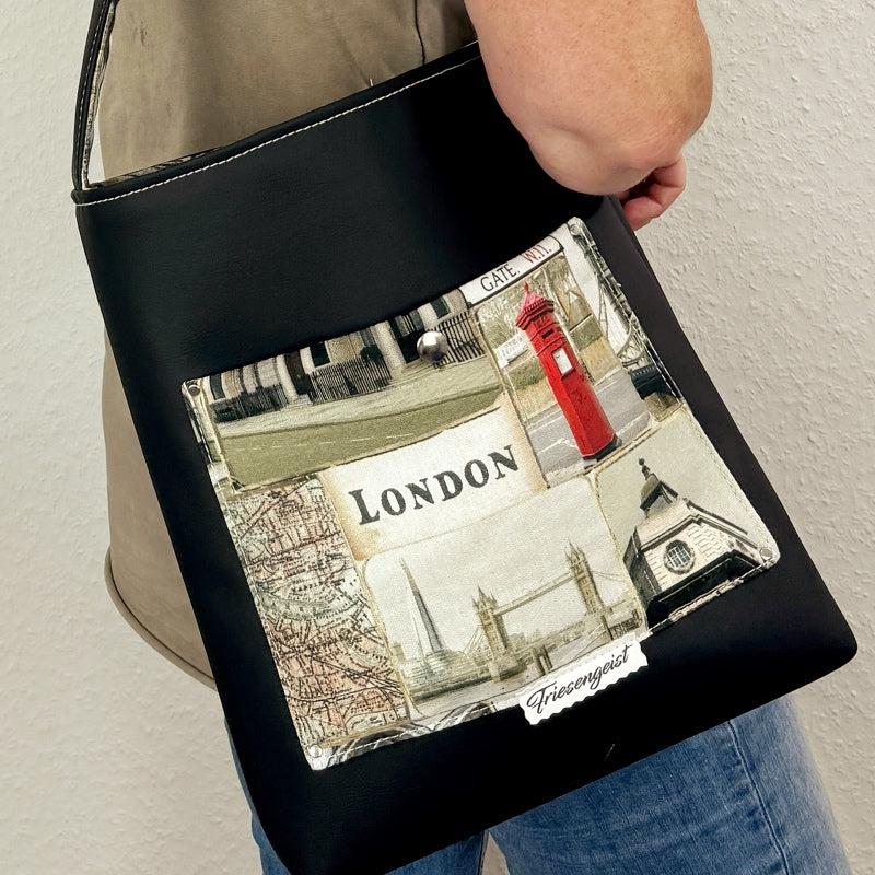 Einkaufsshopper mit einem breiten Schulterträger