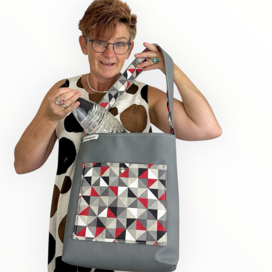 Einkaufsshopper mit einem breiten Schulterträger