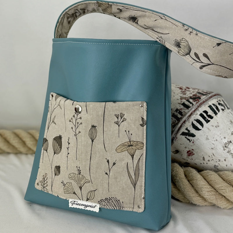 Einkaufsshopper mit einem breiten Schulterträger