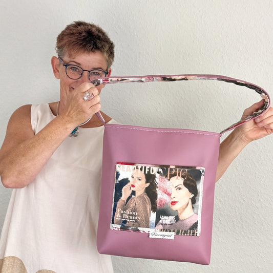 Einkaufsshopper mit einem breiten Schulterträger