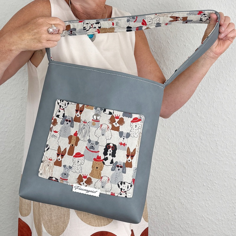Einkaufsshopper mit einem breiten Schulterträger