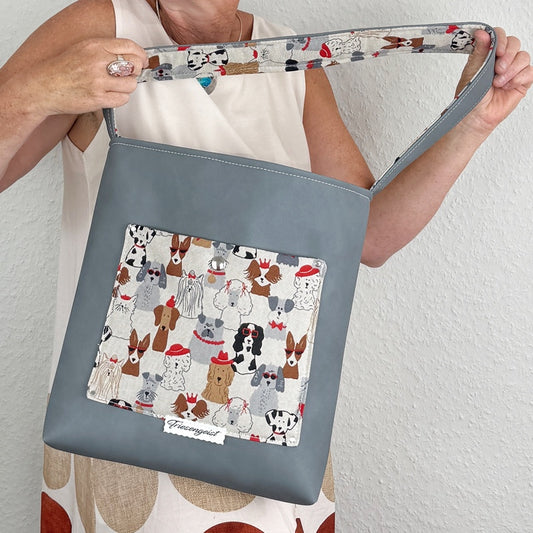 Einkaufsshopper mit einem breiten Schulterträger