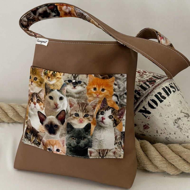 Einkaufsshopper mit einem breiten Schulterträger