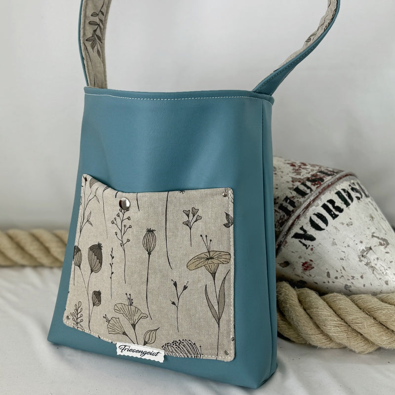 Einkaufsshopper mit einem breiten Schulterträger