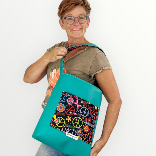 Einkaufsshopper mit einem breiten Schulterträger